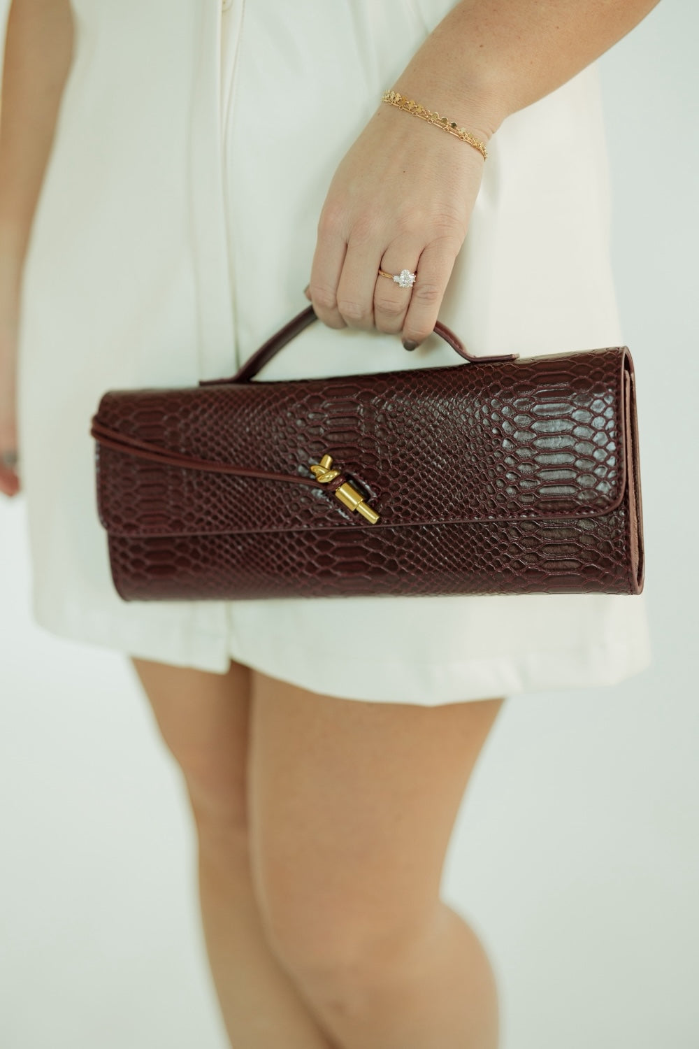 Burgundy Snake Embossed Leather Clutch