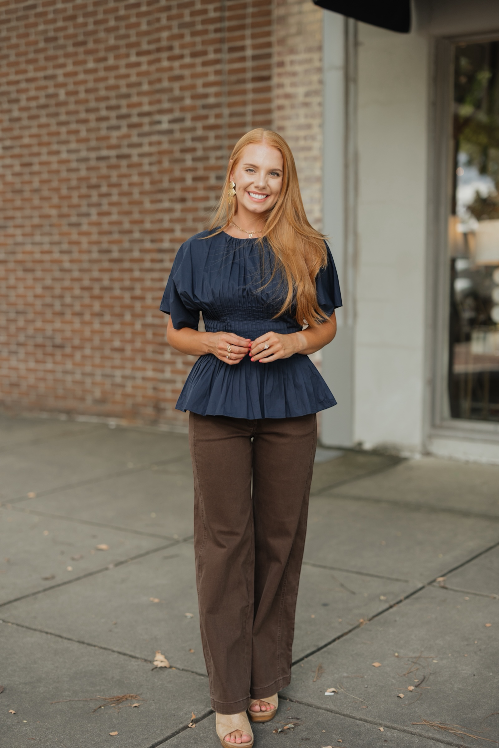 Penelope Navy Pleated Waist Peplum Top