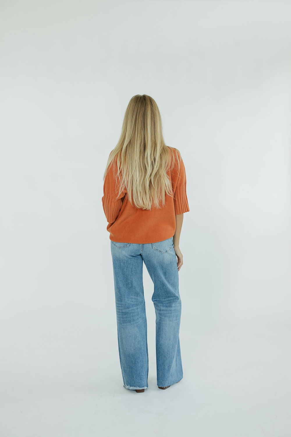 The Maple Turtleneck Sweater in Orange