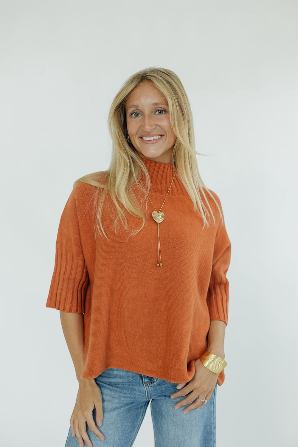 The Maple Turtleneck Sweater in Orange