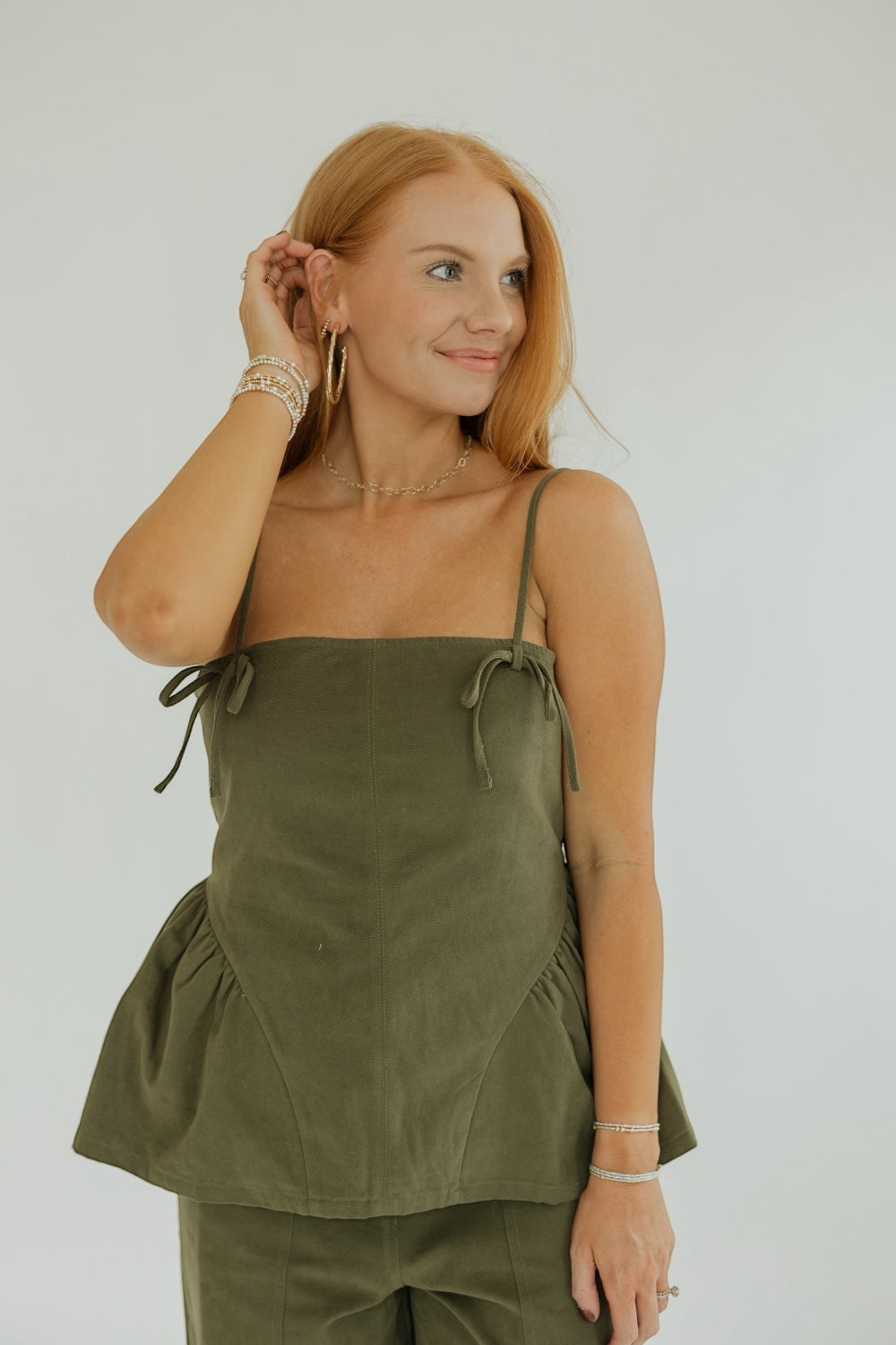 Bonnie Olive Bow Trim Peplum Top