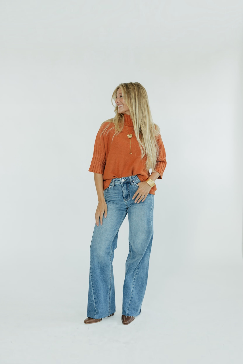The Maple Turtleneck Sweater in Orange