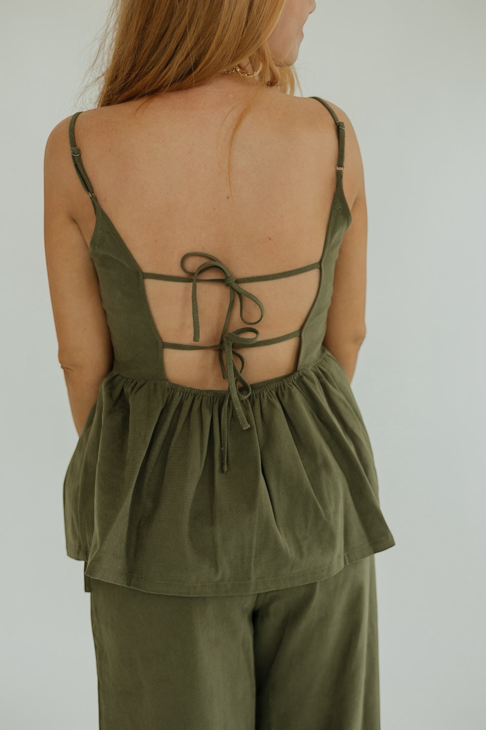 Bonnie Olive Bow Trim Peplum Top