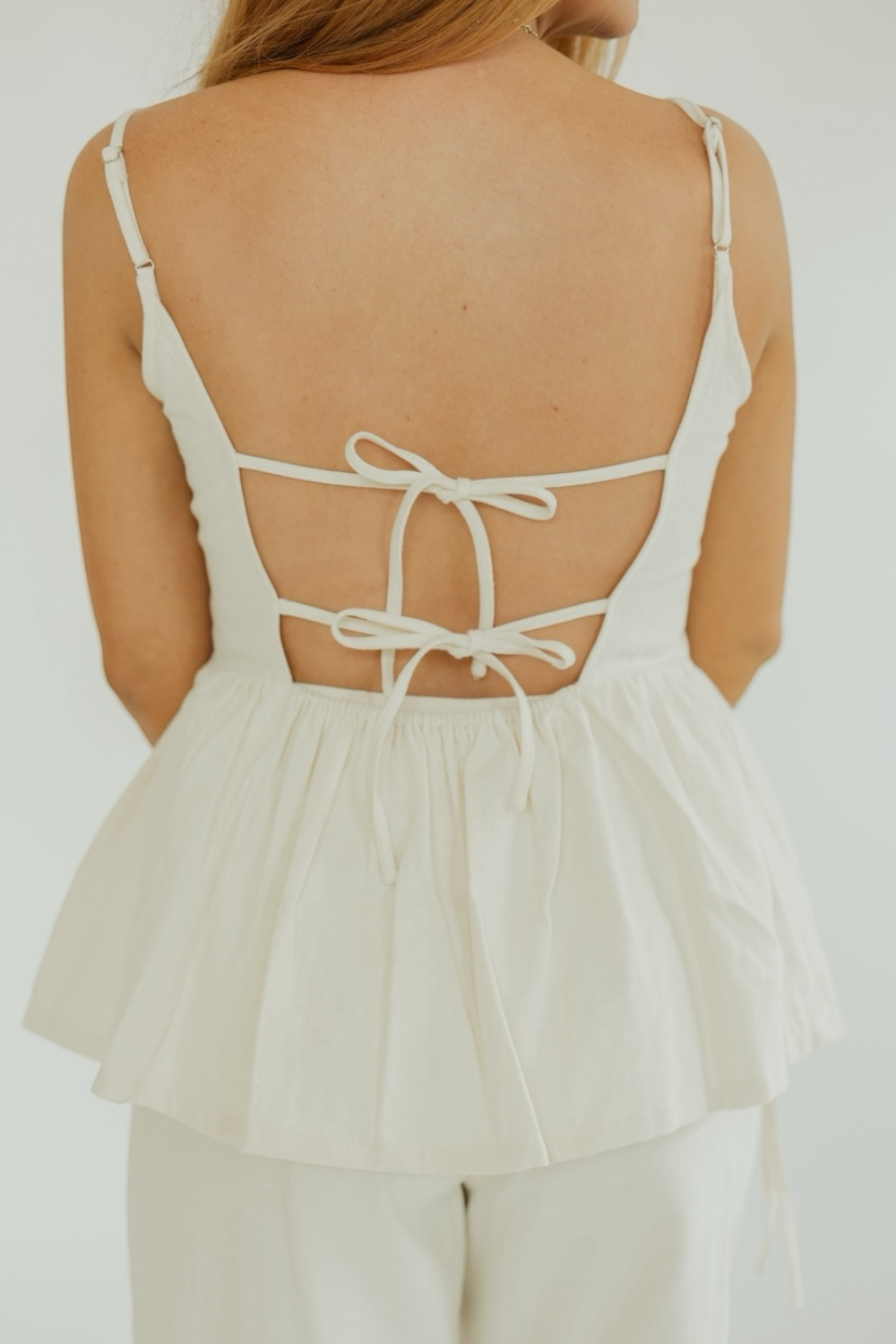 Bonnie Cream Bow Trim Peplum Top
