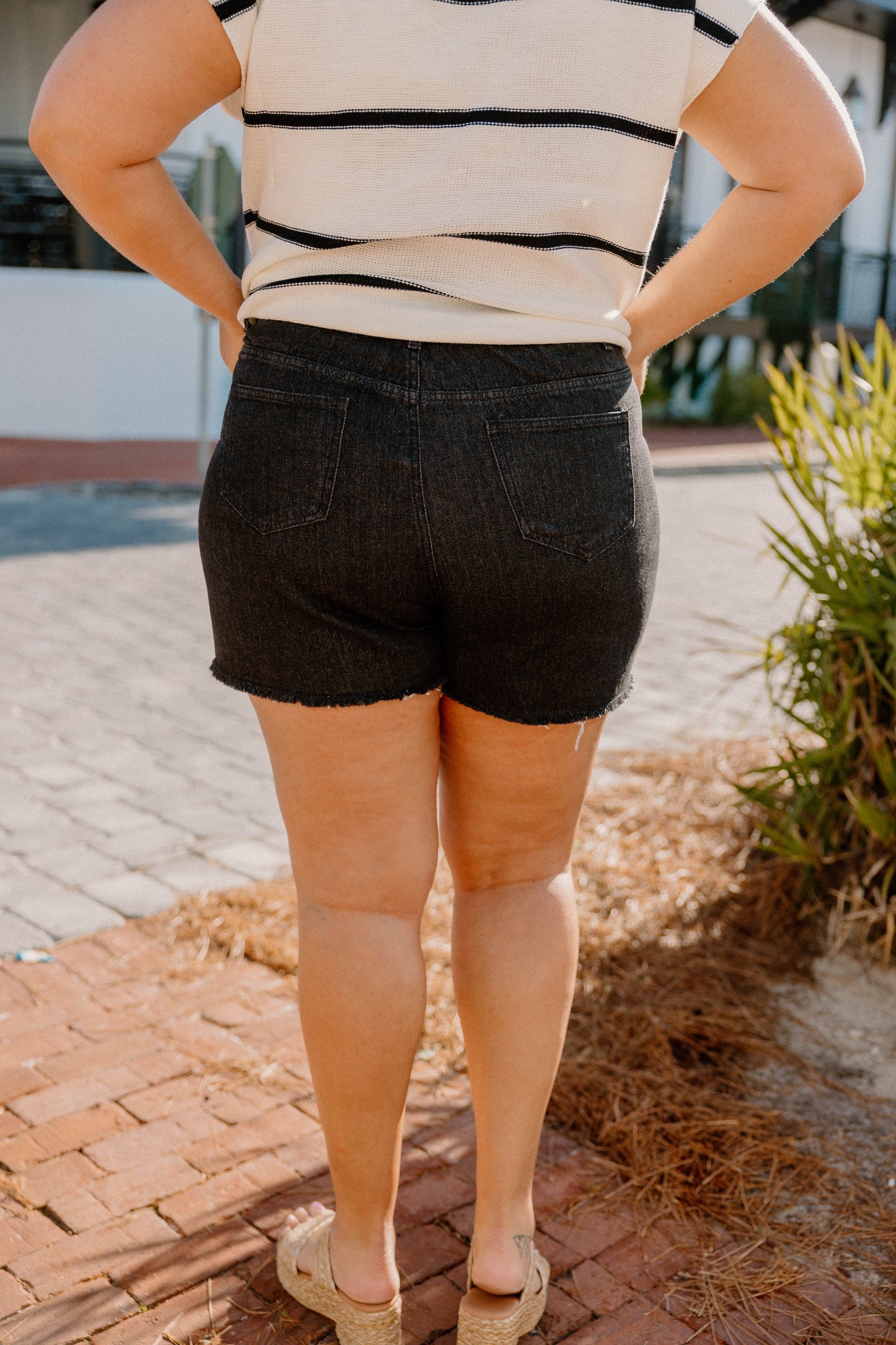 Faye Frayed Distressed Denim Shorts in Black