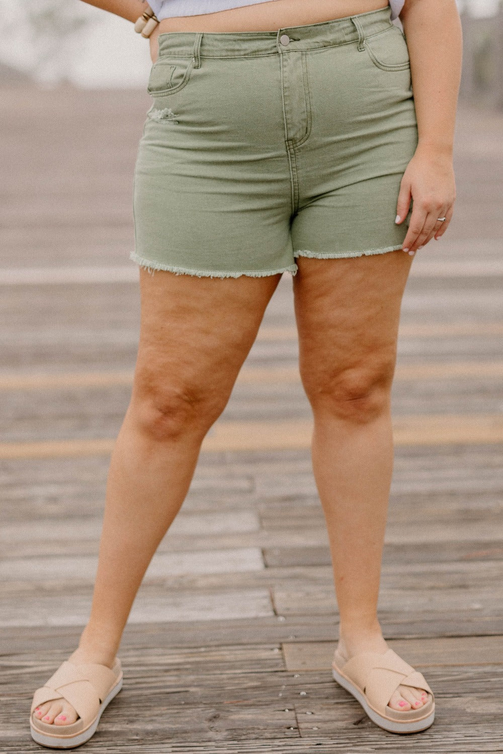 Curvy + Plus Size Denim Shorts in Washed Olive by Hayden LA available at Studio 3:19